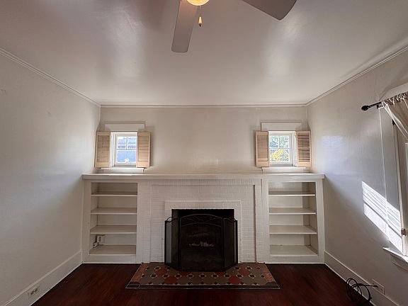 Living room fireplace and shelves