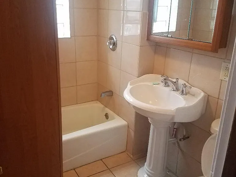Bathroom with cabinet