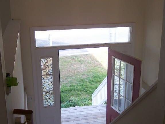 Entry Foyer leading upstairs and to Basement