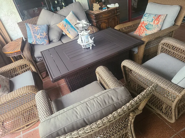 Covered patio fire pit seating for 6 People.