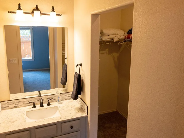 Master bath with walk-in closet