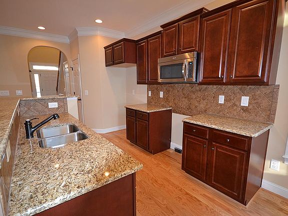Kitchen With Raised Bar Top