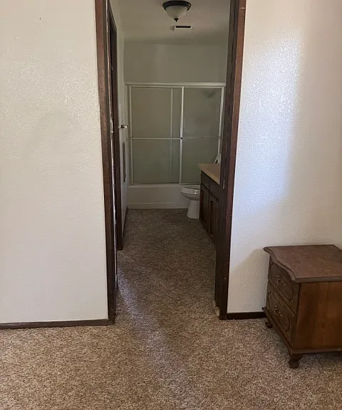 MAIN BEDROOM INTO MAIN BATHROOM