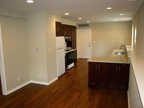 Living room looking toward kitchen