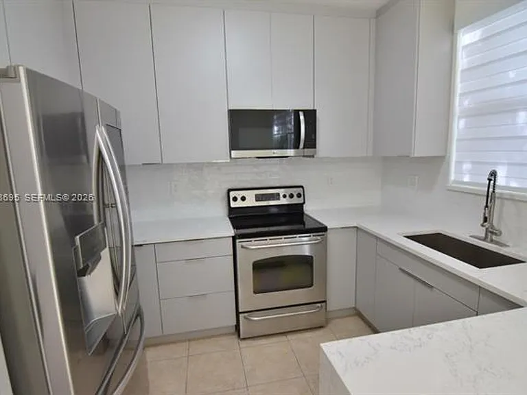 7855 NW 110th Ave #Townhouse 7855 — Photo 1