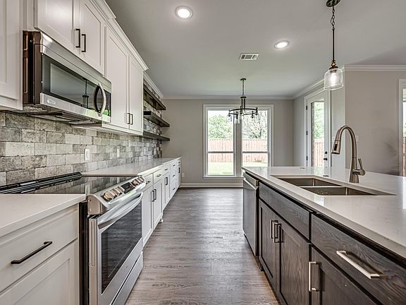 All appliances are SS and brand new. Look at all the extra counters and shelves space