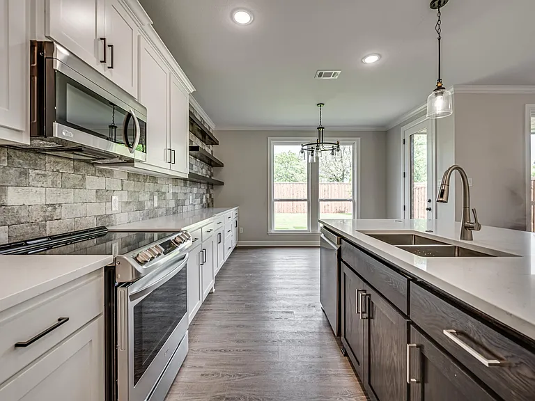 All appliances are SS and brand new. Look at all the extra counters and shelves space