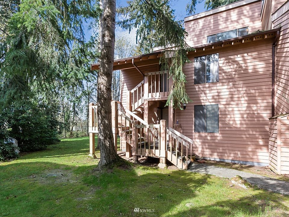 Unit #F-C is an end, top floor unit, located in the Hidden Woods condo complex.