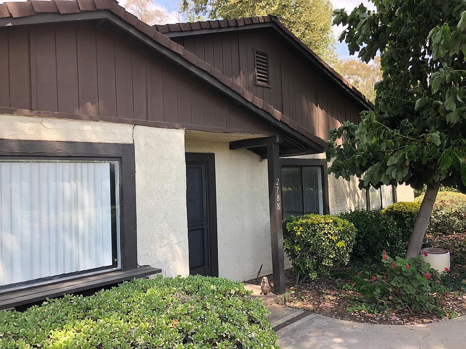 One story, end unit, front door 