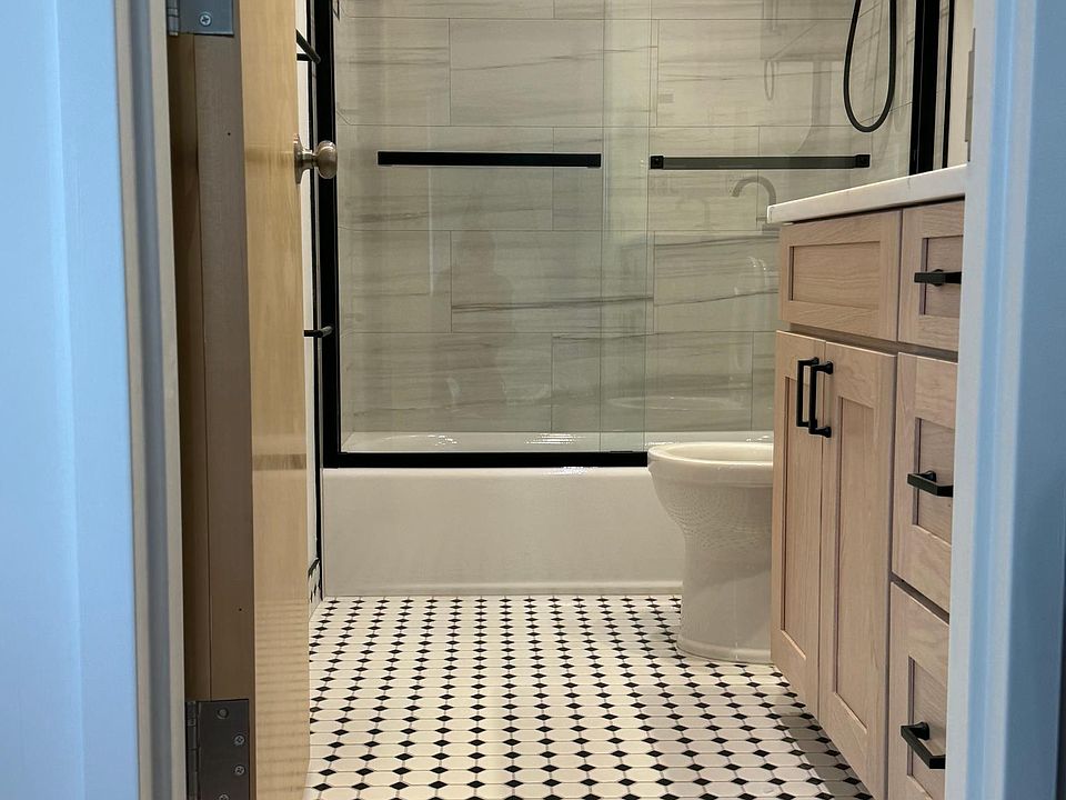Bath w/glass doors and radiant heated tile floors