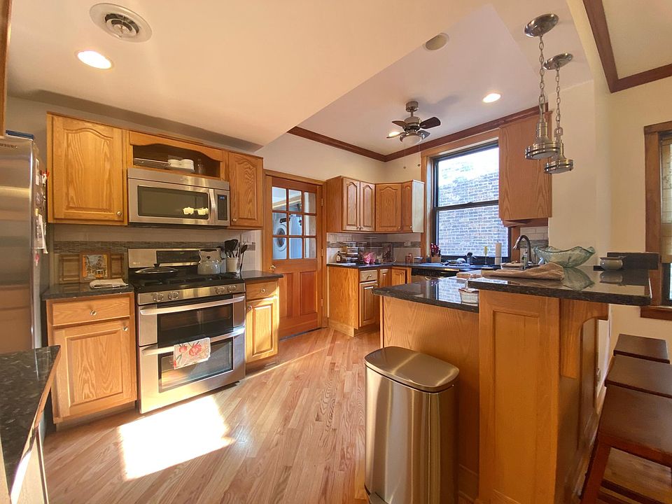 Eat in kitchen with stainless steel appliances