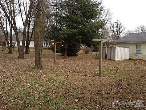 Storage shed. Fenced back yard.  Plenty of large trees.
