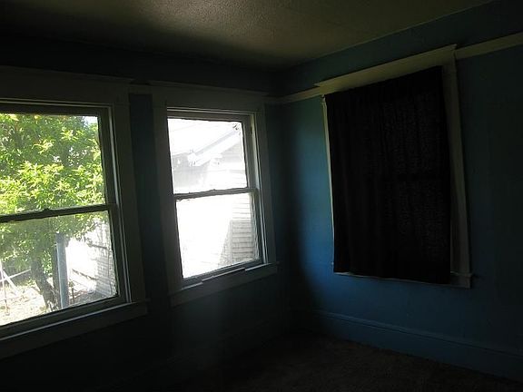 bed next to livingroom