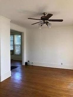 Living room with view into dining room