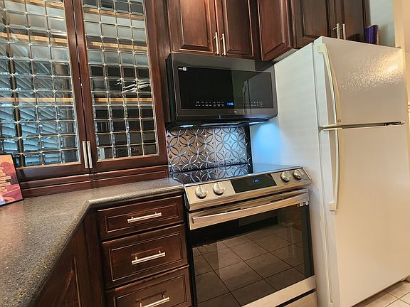 5th image of 5756 S Waterbury Way Unit E