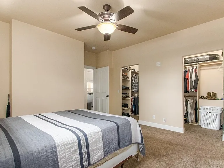 Primary suite with double walk in closets.