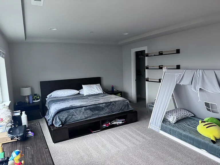 This is a California King bed, and a kid's bed