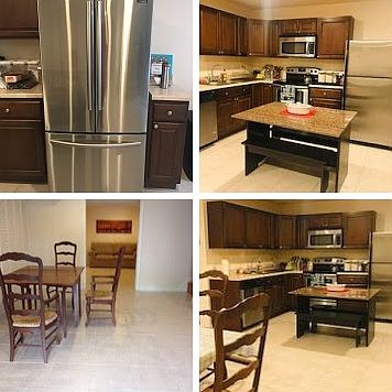 Kitchen, island, and dining table.