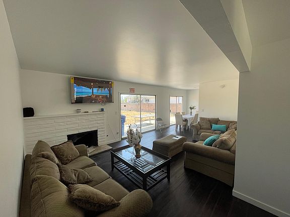 Fully furnished great room and thirsty roomy couches