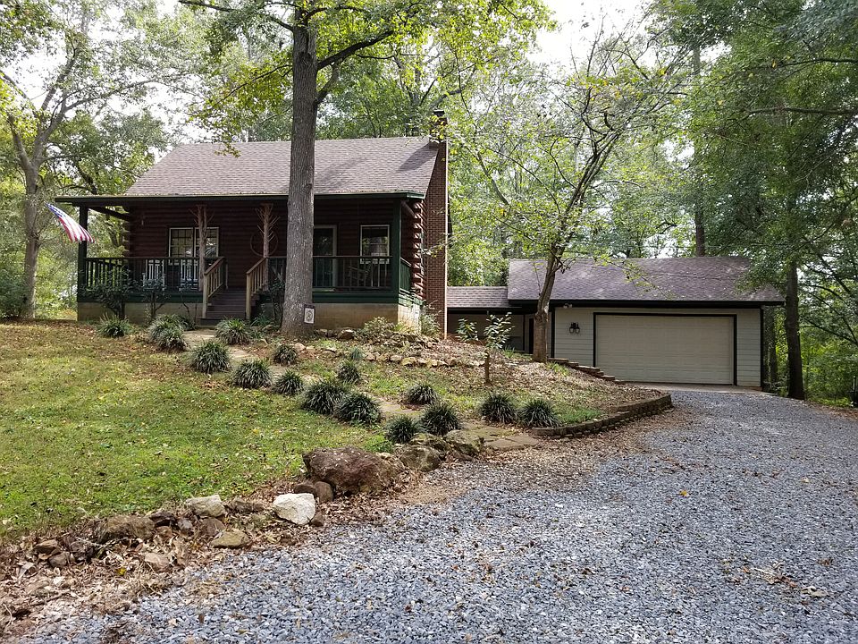 Log cabin & 2 stall garage