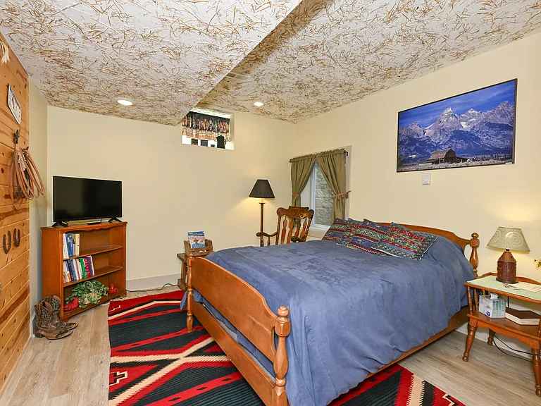 The Bunkhouse BR includes TV, Full/Extra Long mattress, choice of Marriott pillows or gel foam, down comforter, extra blankets and sheet set. Egress window installed per building/fire code.