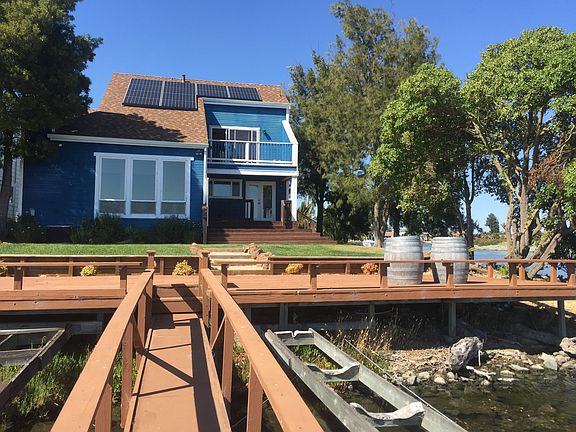 View of house from dock. (new solar)