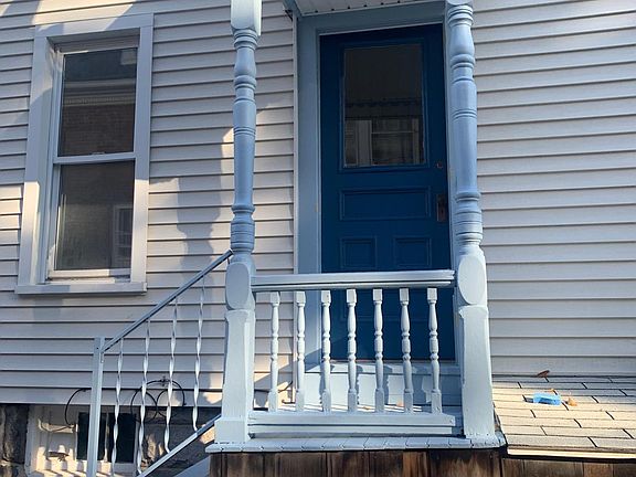 Newly painted side entry to first floor.