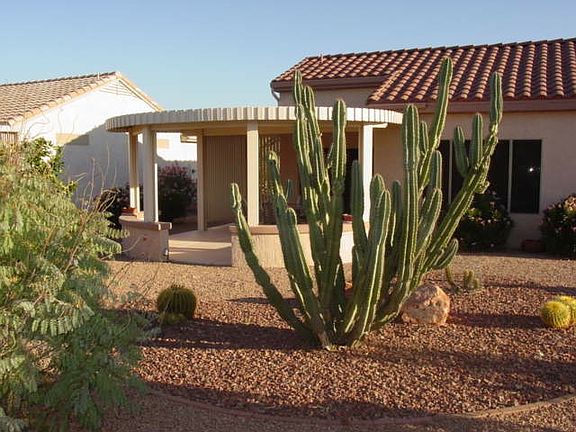 Backyard with fully covered patio