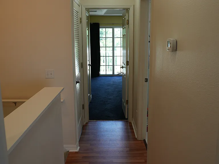 Hall between two bedrooms.