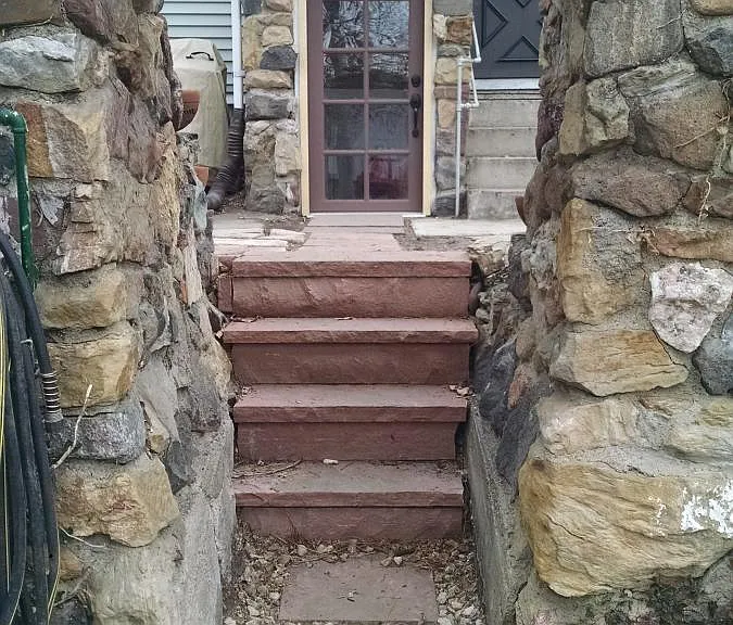 Apartment entry viewed from yard