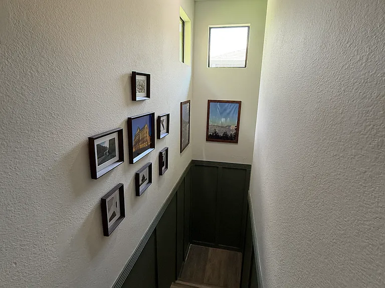 Stairwell wall trim updates.