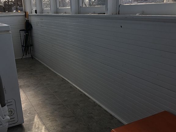 New flooring in sun porch 