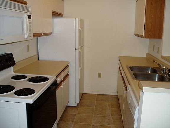 Kitchen with built in microwave and dishwasher