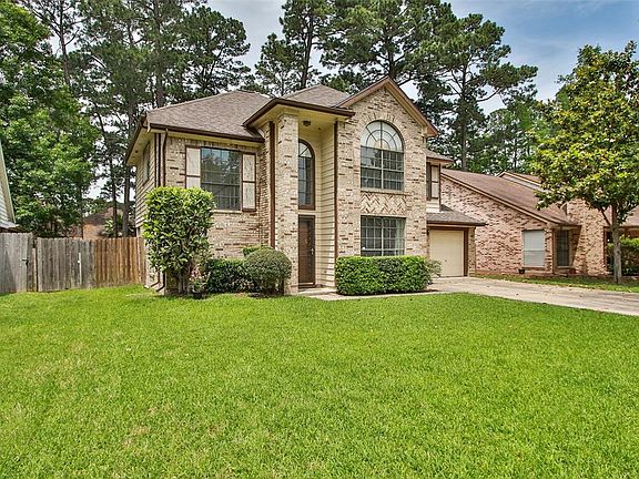 Mature landscaped front yard offers fantastic curb appeal