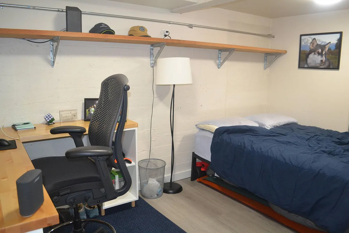 the studio has a separate 'nook' for a bedroom with a division between the sleeping and living areas. - 2020 Taylor Ave #STUDIO