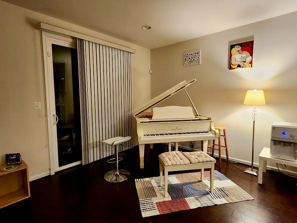 2nd floor living space with baby grand piano!