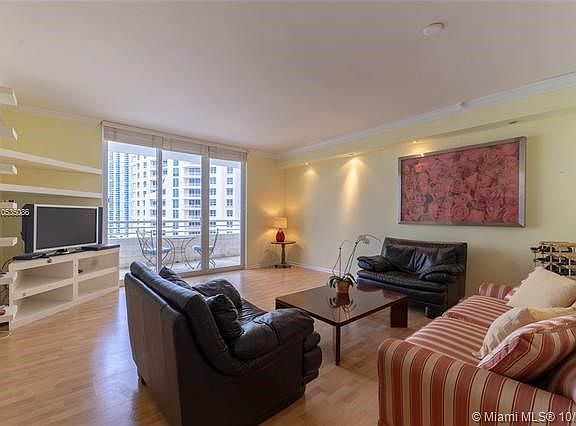 Living-Dining area with access to private balcony