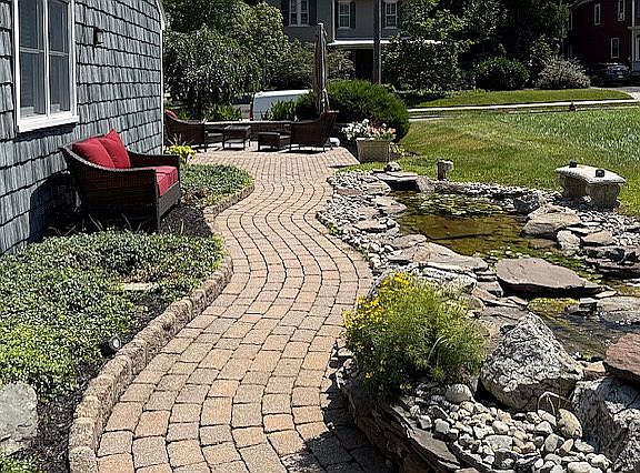Side patio and fish pond