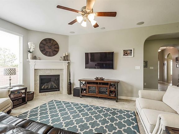 View into living area from kitchen allows you to be part of family activities.