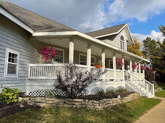 Covered front porch w/ swing