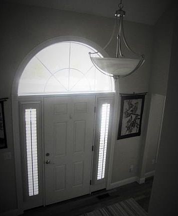 Sunny foyer greets your gue...