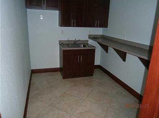 2nd image of 7551 Wiles Rd Ste 203