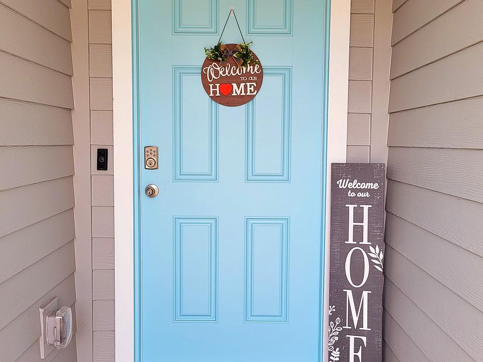 Front Door with Welcome Sign