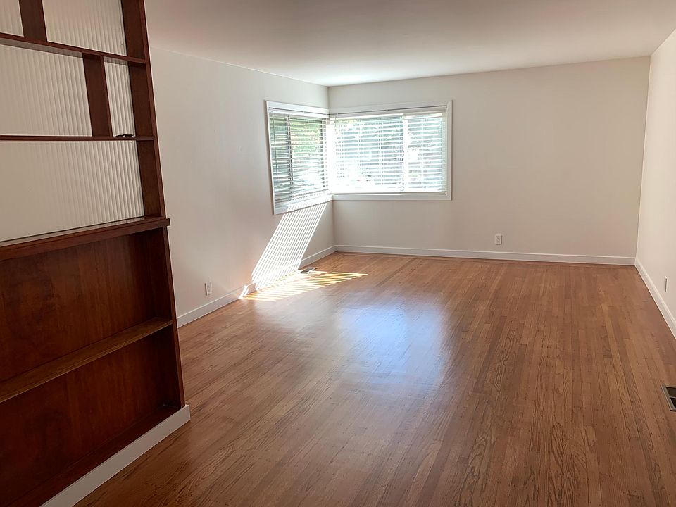 Living room. All new dual paned windows, central heat and air conditioning throughout.