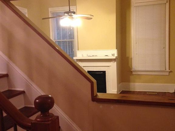 SPIRAL STAIRCASE/FOYER SEE-THRU TO LIVINGROOM