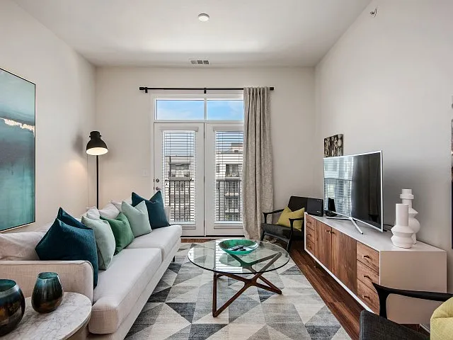 Living Room w/ Walk-out Balcony