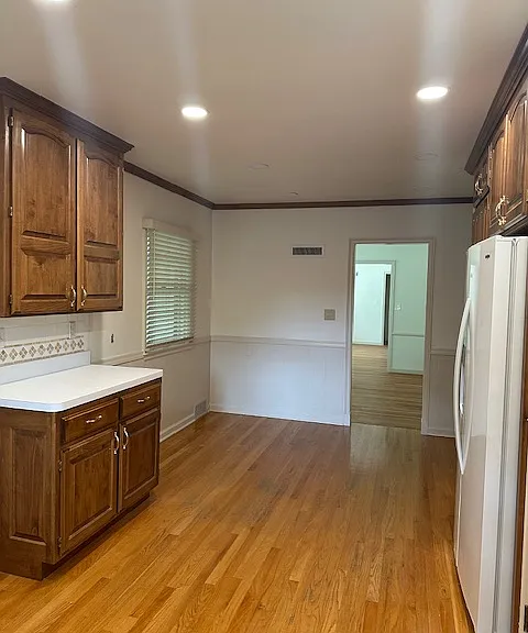 1204 W 68th Ter — Photo 13
