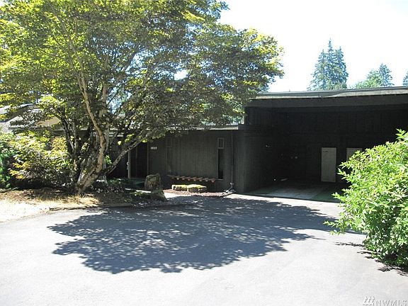 Huge carport, maybe turn it into a garage.  Loads of parking