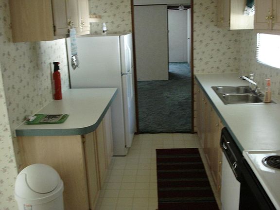 Kitchen towards living, hall, 2nd bdr