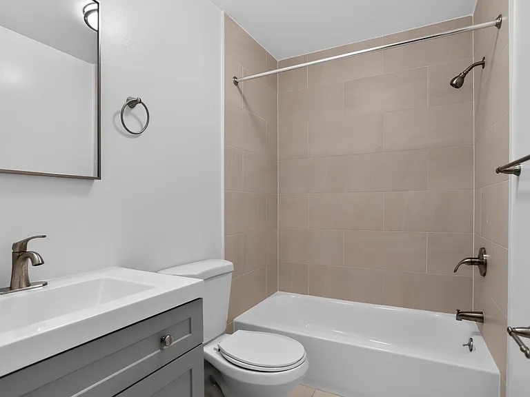 Step into serene living at Miry Run Apartments, where modern design meets functionality. This spacious bathroom offers elegant finishes and ample natural light. Imagine unwinding here after a long day. Schedule your tour today!